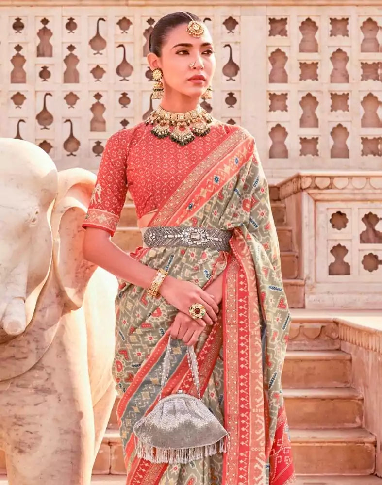 Image of Light Green Ikat Print Patola Saree