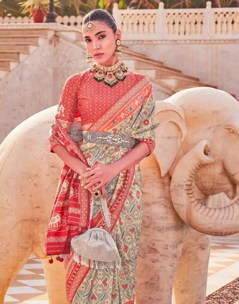 Image of Light Green Ikat Print Patola Saree