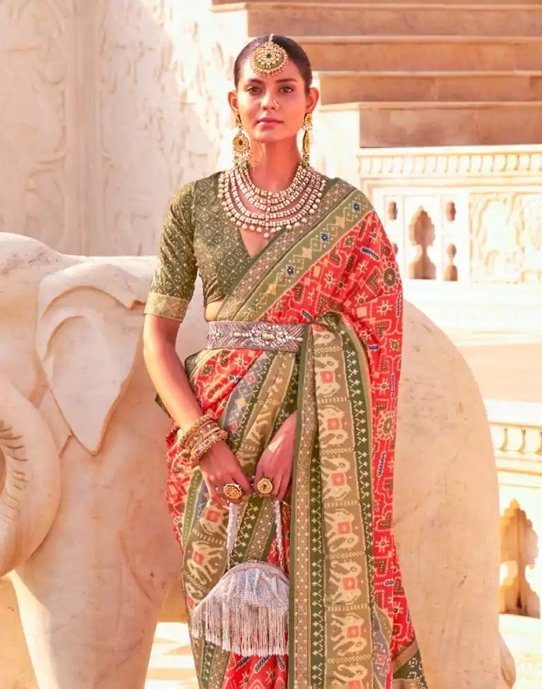 Image of Orange Ikat Print Patola Fabric Saree