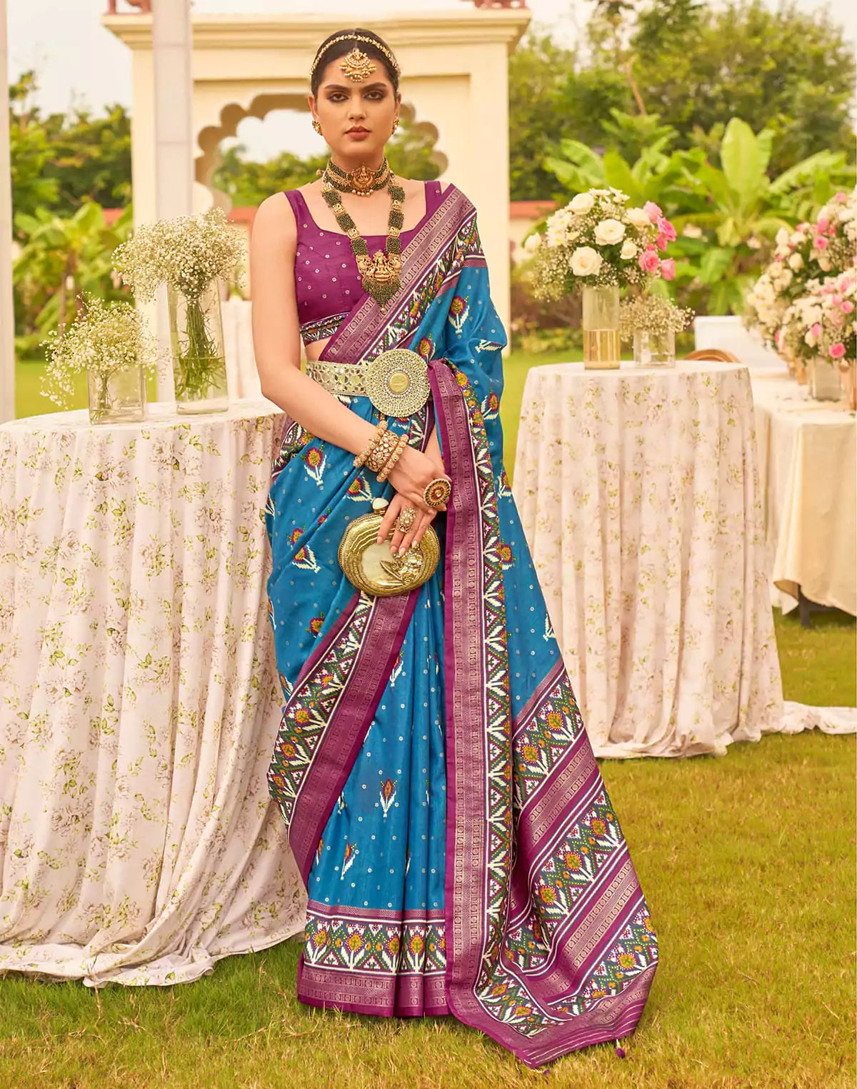 Image of Captivating Blue Patola Silk Floral Festive Wear Saree