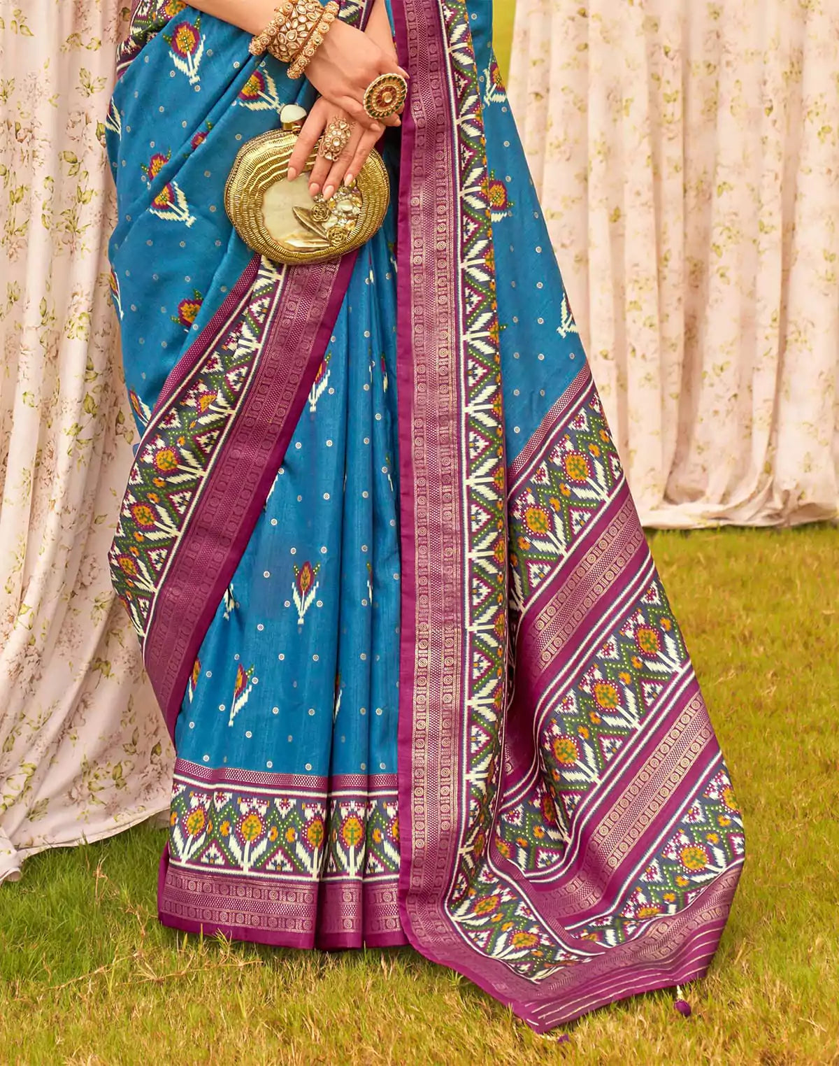 Image of Captivating Blue Patola Silk Floral Festive Wear Saree