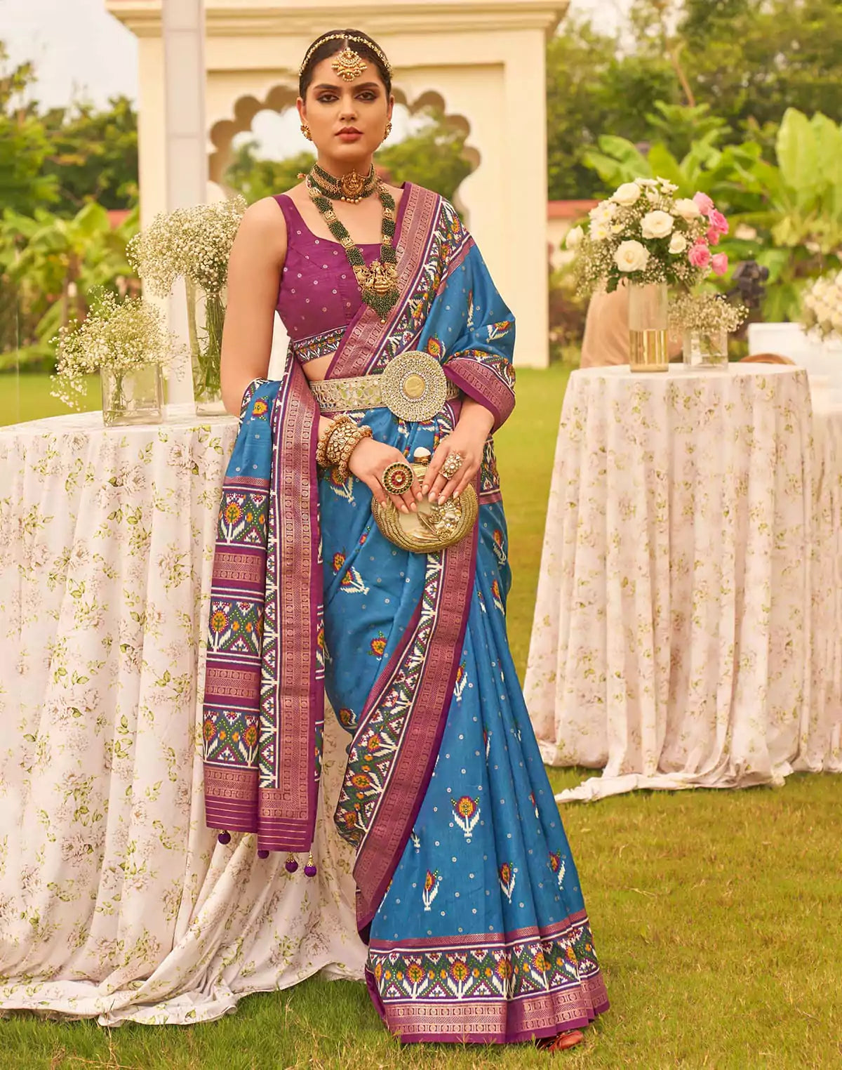 Image of Captivating Blue Patola Silk Floral Festive Wear Saree
