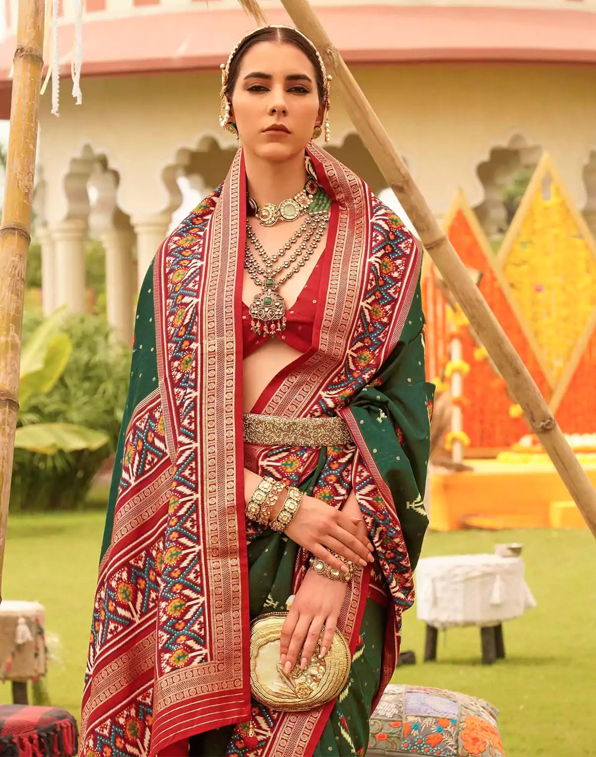 Image of Dark Green Woven design Patola Silk Festive Saree