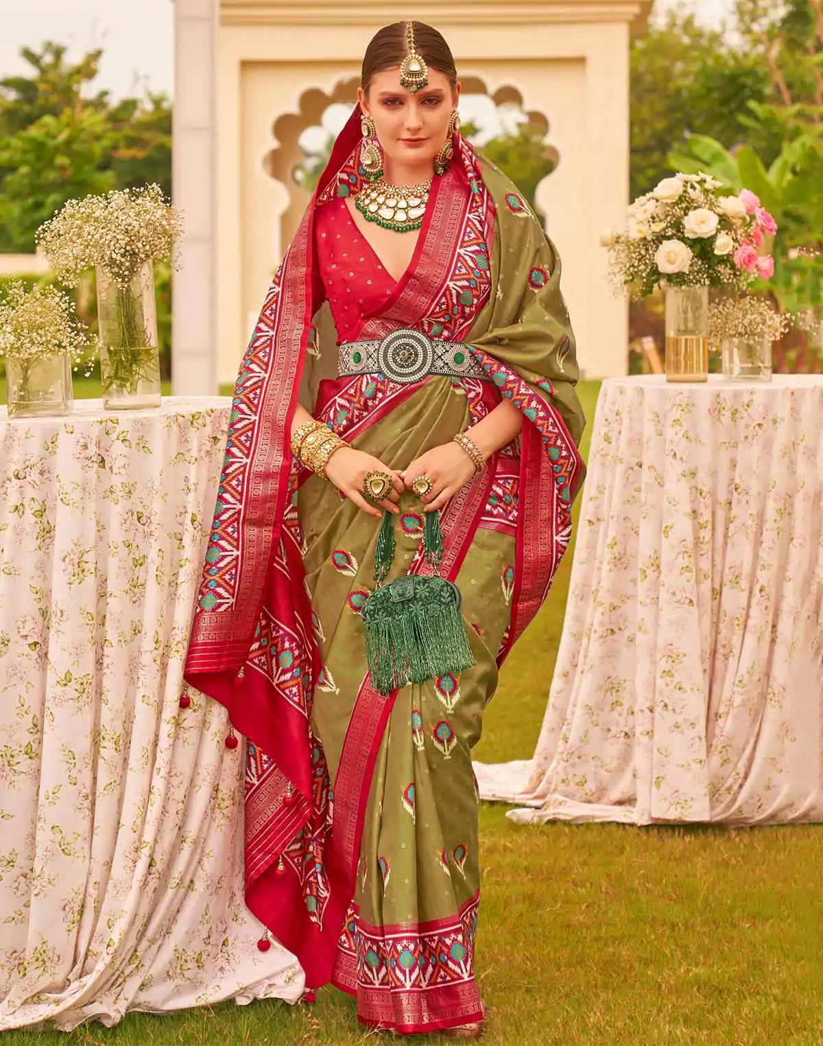 Image of Stunning Mehendi Green Soft Patola Silk Saree
